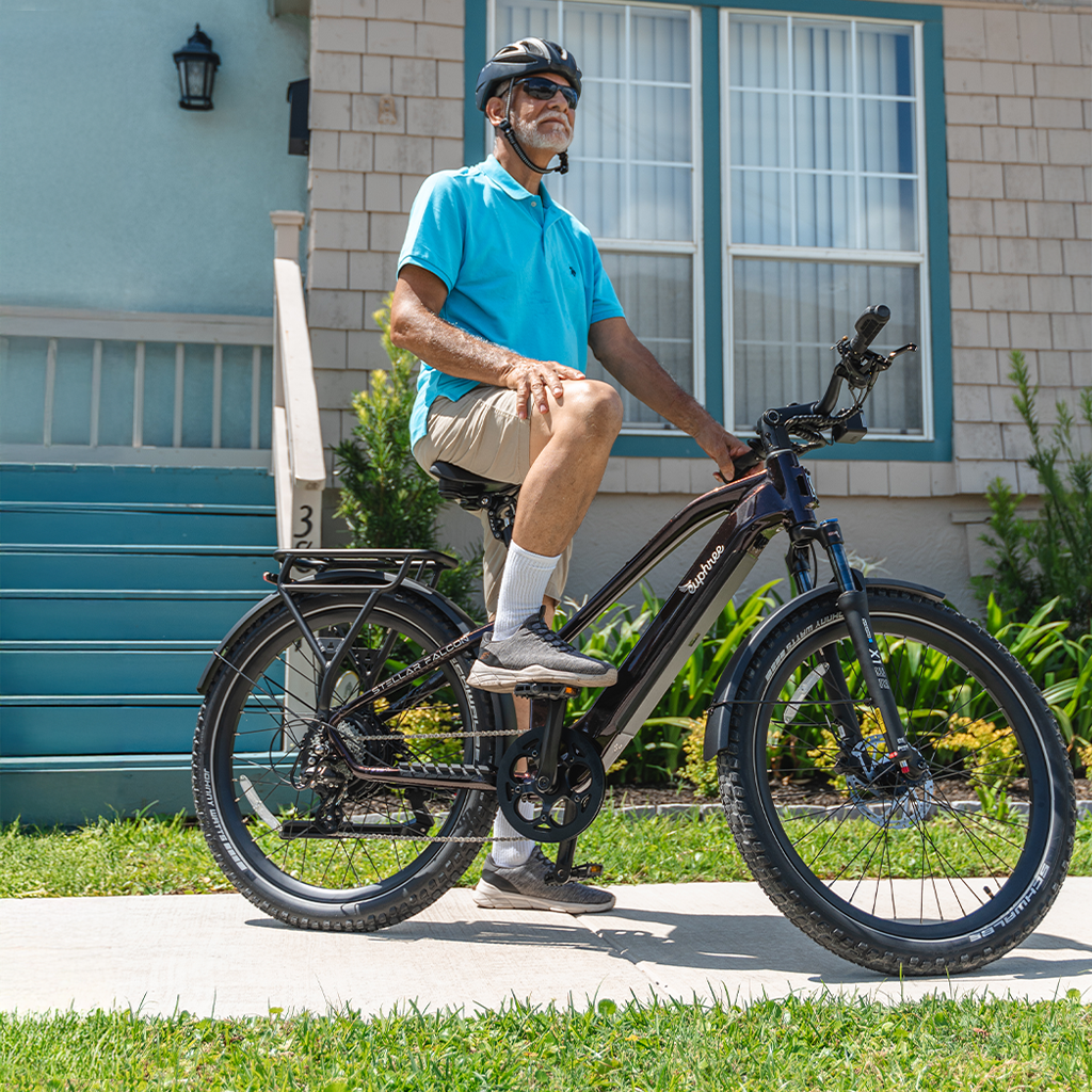Rider enjoying a ride on the Euphree Stellar Falcon mid-step in black cherry